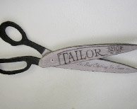 Precision tailoring work at Paul's Tailors